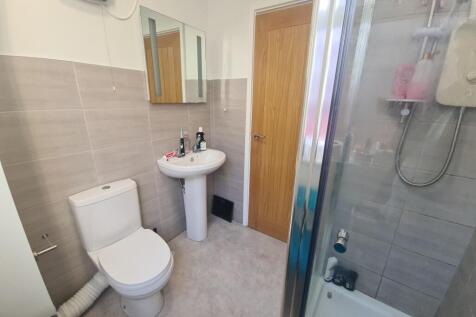 A modern and well-maintained bathroom featuring...