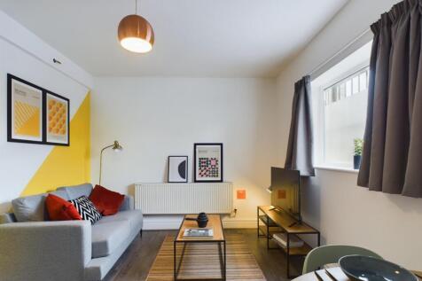 A spacious and stylish modern living room, perf...