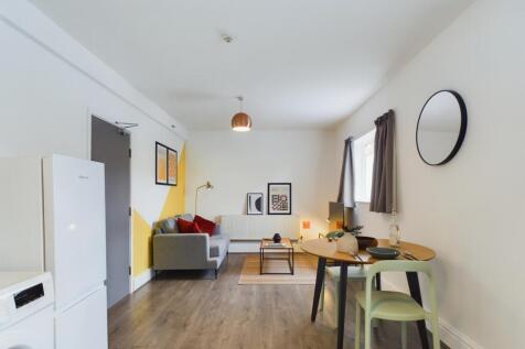 A spacious and stylish modern living room, perf...