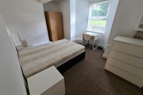 Bright furnished double bedroom with a large wi...