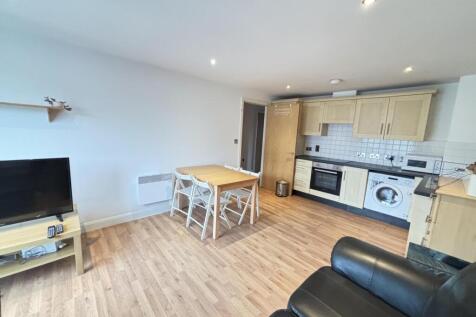 Bright and spacious living room featuring moder...