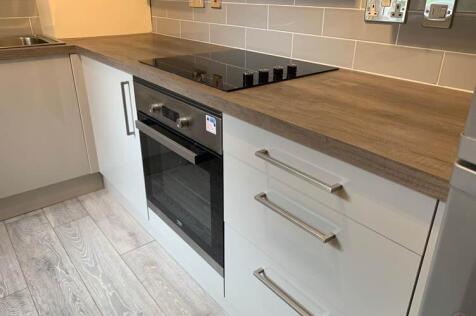 A modern, well-maintained kitchen featuring a s...