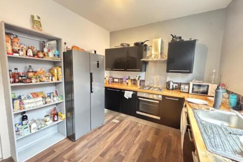 A bright and well-maintained kitchen featuring ...