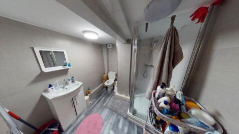 A tidy and well-maintained bathroom featuring a...