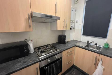 A modern kitchen with ample countertop space, f...