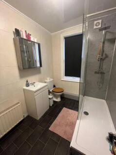 A clean and functional bathroom with a modern s...