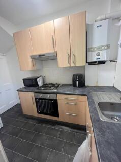 A modern, well-maintained kitchen area with com...