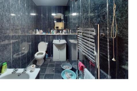 A clean and well-maintained bathroom with a mod...