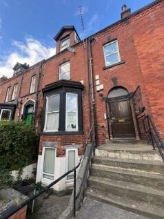 Exterior view of a traditional brick property s...