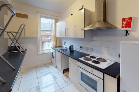 A modern and well-maintained kitchen area featu...