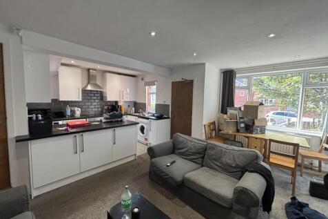 Bright and spacious living room with modern dec...