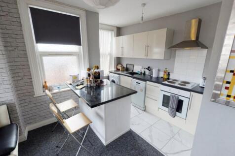 Modern and well-organized kitchen featuring amp...