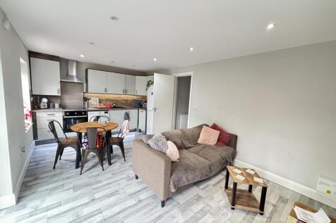 Bright and spacious living room with modern dec...