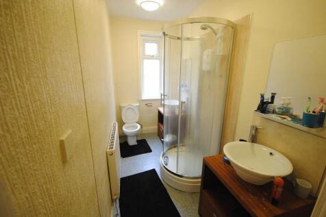 A clean and well-maintained bathroom with a mod...