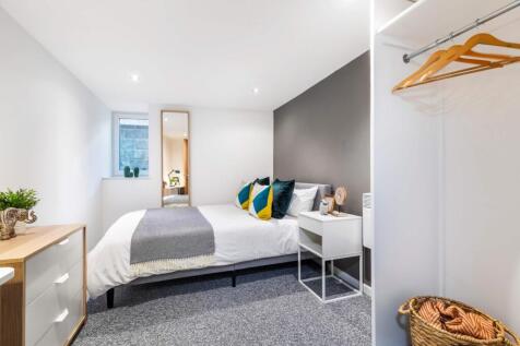 A bright and well-maintained spacious bedroom f...