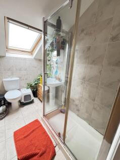 A clean and well-maintained bathroom featuring ...