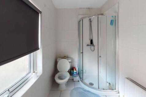 A clean and well-maintained bathroom featuring ...