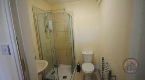 A clean and well-maintained bathroom featuring ...