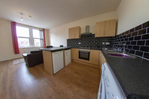 Modern kitchen with ample counter space, black ...