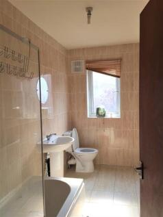 A clean and functional bathroom featuring a toi...