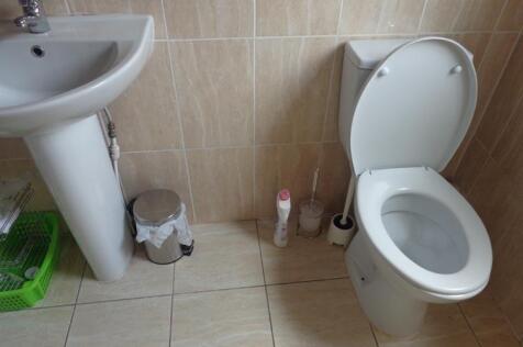 A clean and well-maintained bathroom featuring ...