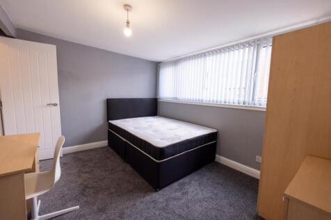 Bright, well-presented bedroom with a comfortab...