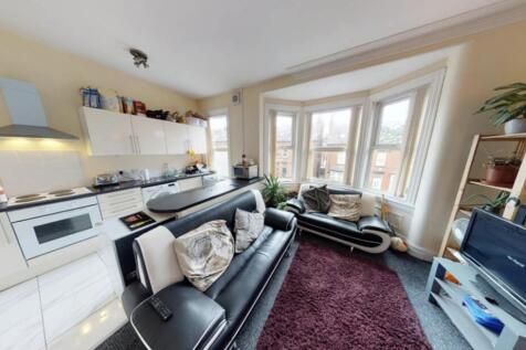 Bright and welcoming living room filled with na...