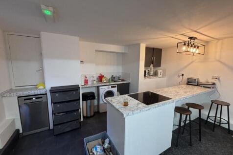 Modern kitchen with ample counter space and a c...