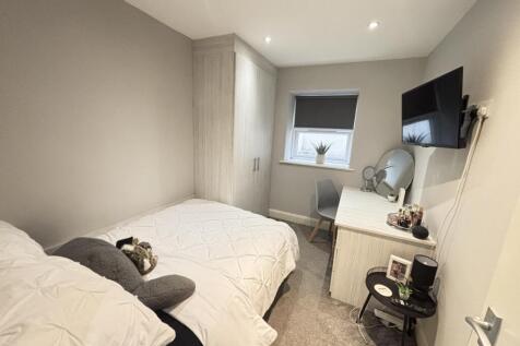 A well-presented double bedroom with neutral de...
