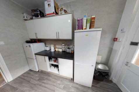 A well-maintained kitchen area featuring storag...