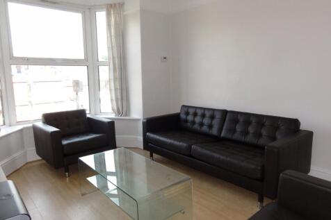 Bright and spacious contemporary living room fe...