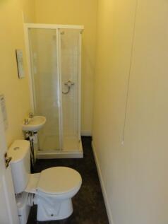 A clean and functional bathroom featuring a toi...