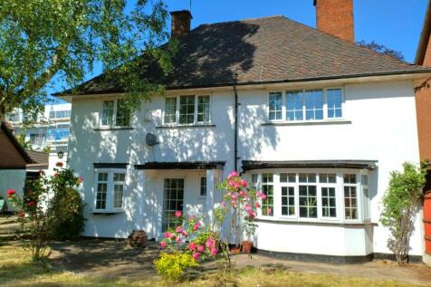 Attractive semi-detached house with a white ren...
