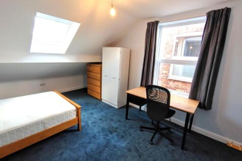 Bright, recently updated bedroom with a skyligh...