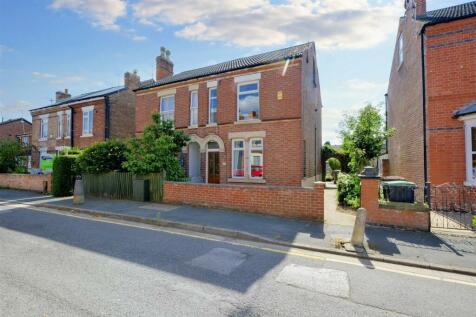 Well-presented red-brick semi-detached house wi...