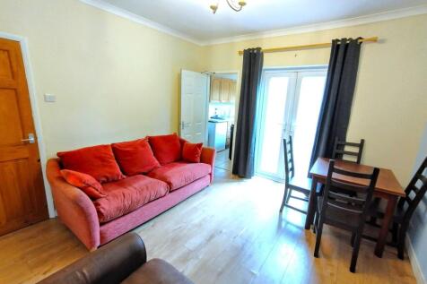 Bright furnished living room with a comfortable...