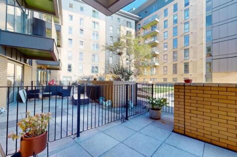 A view of the outdoor patio area with potted pl...