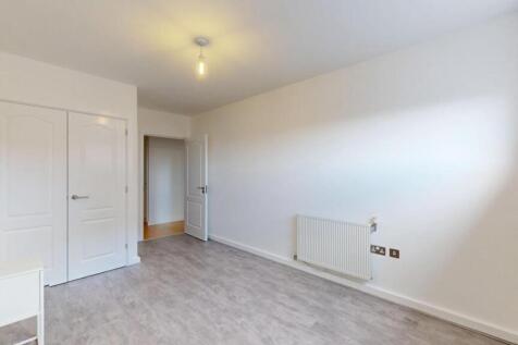 Bright and clean minimalist room with light-col...