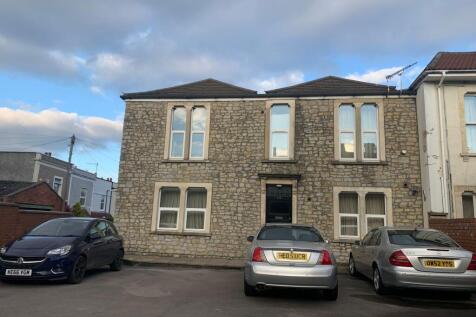 Stone-fronted terraced house with symmetrical w...