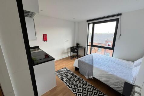 Bright, modern studio-style double bedroom with...