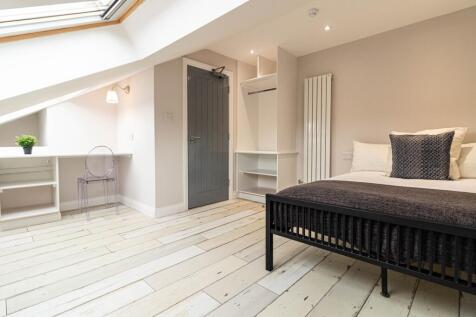 Bright, recently renovated bedroom with whitewa...