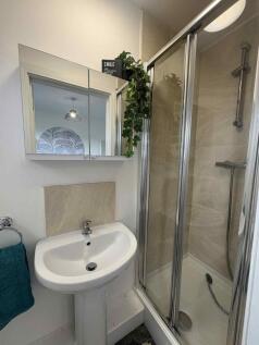 Well-presented bathroom with a modern tiled sho...