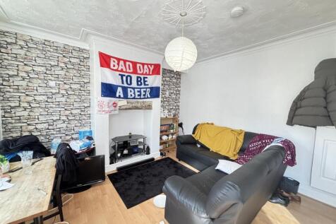 A modern and inviting living room featuring a c...