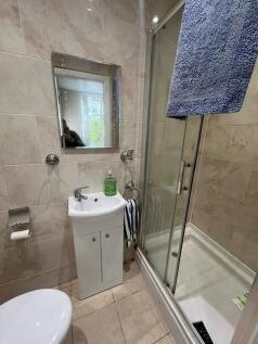 Well-presented bathroom with a modern shower en...