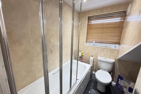 A clean and well-maintained bathroom featuring ...