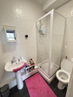 A clean and well-maintained bathroom featuring ...