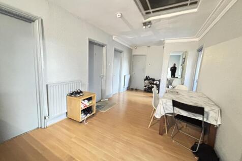 A bright and clean living room featuring ample ...