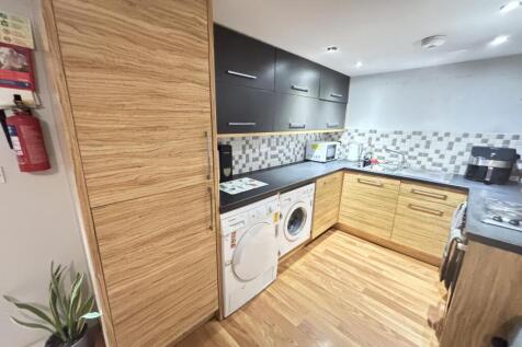 A modern, well-maintained kitchen featuring a m...