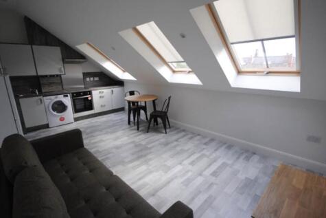 Bright and spacious contemporary living room wi...