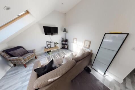 A bright and inviting contemporary living room ...